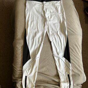 Victoria’s Secret Sport white and black leggings with zipper and mesh details